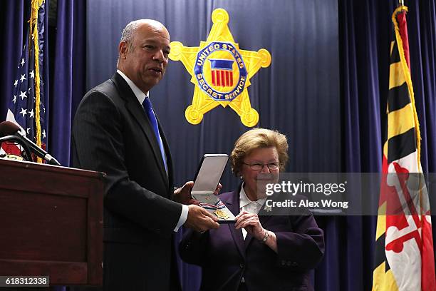 Sen. Barbara Mikulski is presented with a DHS Distinguished Public Service Medal by Secretary of Homeland Security Jeh Johnson during a visit to the...