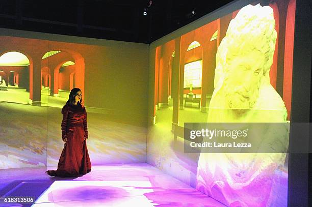 An actress performs on stage during a rehearsal at the 3D theatre at Perceptual Robotics Laboratory of Scuola Superiore Sant'Anna of Pisa on October...