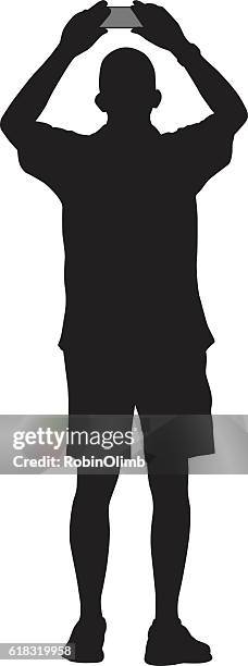 man taking picture with smart phone - camera stand stock illustrations