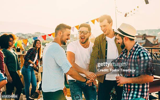 best friends at a party - office party stock pictures, royalty-free photos & images