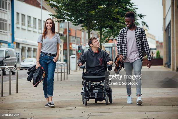 friends going to town - quadriplegic stock pictures, royalty-free photos & images