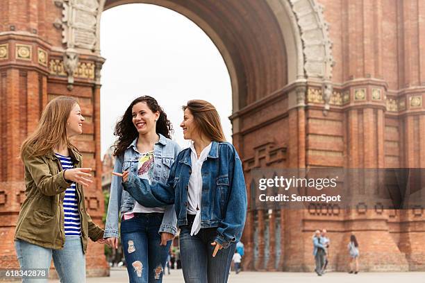 young tourists walking and having fun in barcelona - barcelona tours stock pictures, royalty-free photos & images