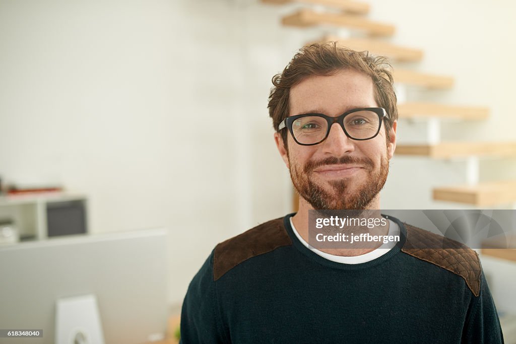 Shot of a young entrepreneur using a mobile phone