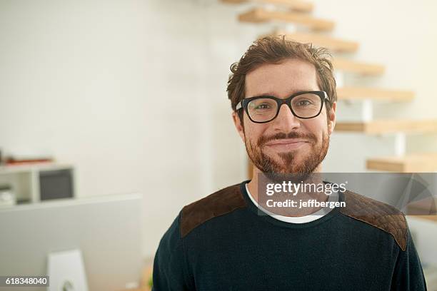 shot of a young entrepreneur using a mobile phone - cheerful businessman stock pictures, royalty-free photos & images