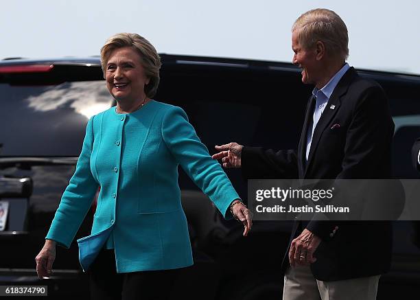 Democratic presidential nominee former Secretary of State Hillary Clinton and U.S. Sen. Bill Nelson arrive at Tampa International Airport on October...