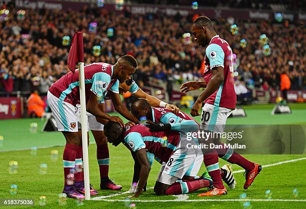 Cheikhou Kouyate of West Ham United celebrates scoring his sides first goal with his West Ham United team mates during the EFL Cup fourth round match...