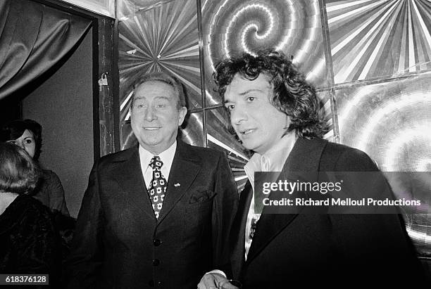 Popular French singer Michel Sardou is greeted by composer Charles Trenet backstage at the Olympia in Paris. Sardou was joined by many of his...