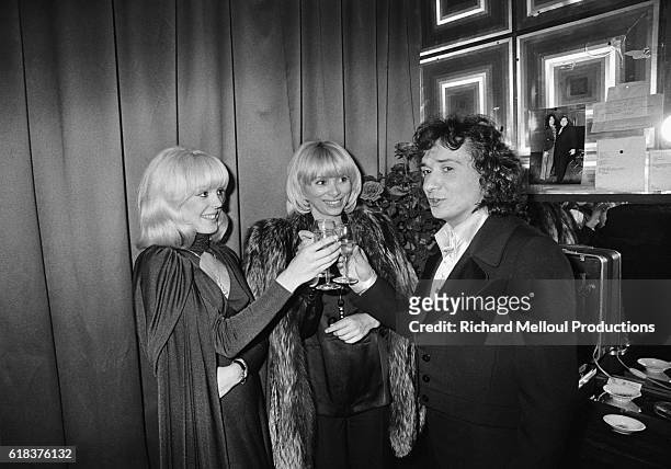 Popular French singer Michel Sardou is joined backstage at the Olympia by his fiancee Babette and actress Mireille Darc. Sardou was joined by many of...