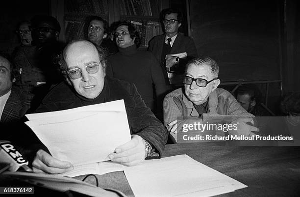 Writer and philosopher Jean-Paul Sartre and attorney Klaus Croissant give a press conference in Paris to discuss leftist Andreas Baader's...