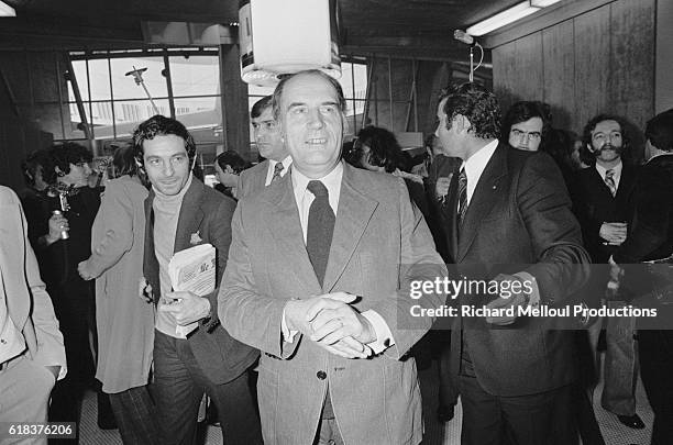 Francois Mitterrand, leader of the French Socialist Party, returns to France after visiting his son's future in-laws in Tahiti. Mitterrand's son,...