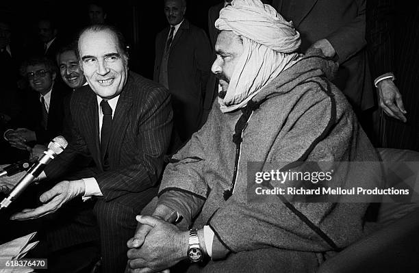 Mohamed Ould Ziou, leader of the Sahrawi national council, meets with French Socialist leader Francois Mitterrand in Algiers to announce the...