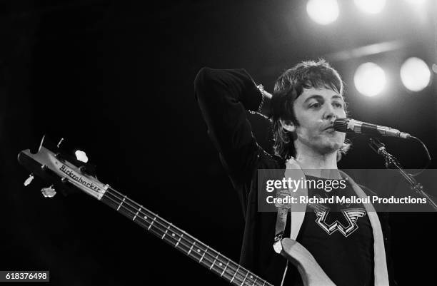 Paul McCartney, singer and guitarist for his band Wings, performs during a concert in Paris.