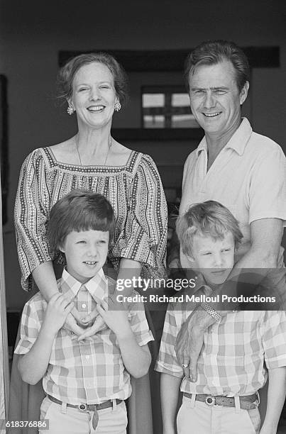 Queen Margrethe of Denmark and Prince Henrik stand behind their two sons, Crown Prince Frederik and Prince Joachim , shortly after their tenth...