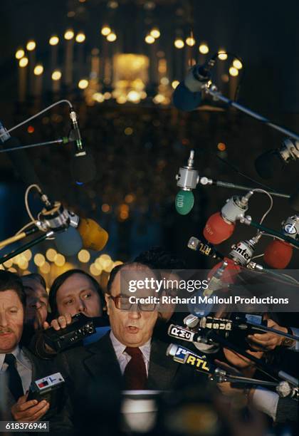 Francois Mitterrand speaks to a group of journalists during a press conference at the Palais de l'Elysee. Mitterrand was the leader of the Parti...