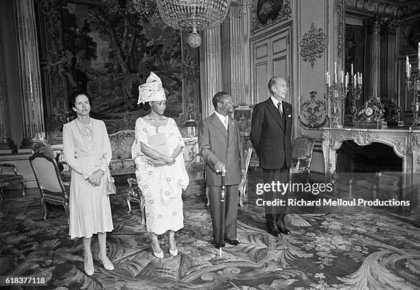 Jean-Bedel Bokassa, national head of state of the Central African Republic, and his wife Catherine attend lunch at the Palais de l'Elysee with French...