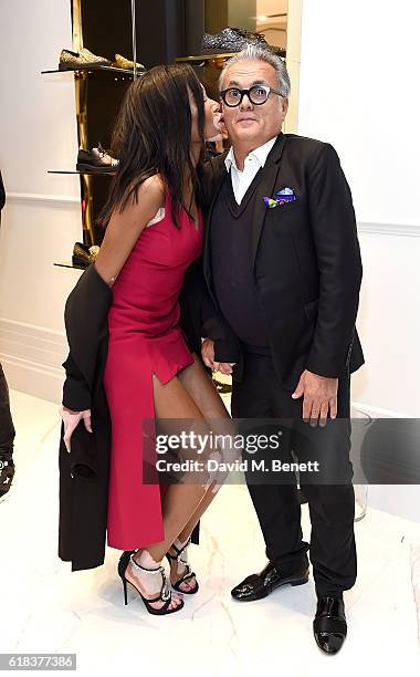 Winnie Harlow and Giuseppe Zanotti attend the Giuseppe Zanotti London flagship store launch on October 26, 2016 in London, England.