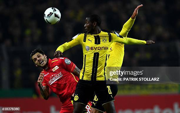 Dortmund's Columbian striker Adrian Ramos and Berlin´s Eroll Zejnullahu vie for the ball during the German Cup DFB Pokal second round football match...