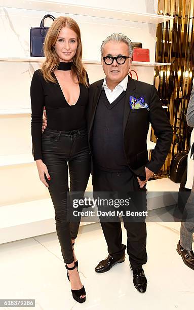 Millie Mackintosh and Giuseppe Zanotti attend the Giuseppe Zanotti London flagship store launch on October 26, 2016 in London, England.