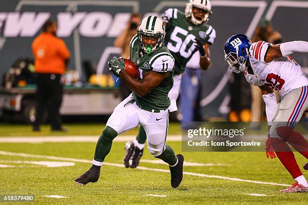 New York Jets wide receiver Jeremy Ross returns a punt during the preseason game between the New York Jets and the New York Giants played at Met Life...