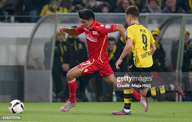 Emre Mor of Dortmund and Eroll Zejnullahu of Berlin battle for the ball during DFB Cup second round match between Borussia Dortmund and 1. FC Union...