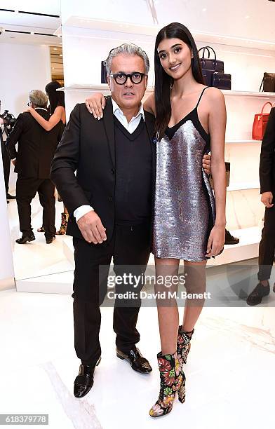 Giuseppe Zanotti and Neelam Gill attend the Giuseppe Zanotti London flagship store launch on October 26, 2016 in London, England.