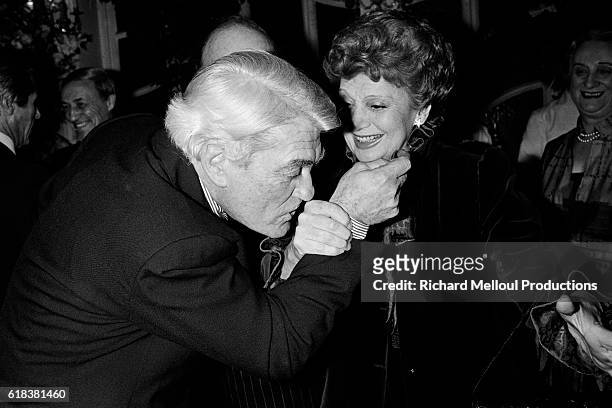 Actor Jean Marais kisses the hand of Edwige Feuillere at an event in Paris where Feuillere was decorated with the Legion d'Honneur medal. Edwige is...