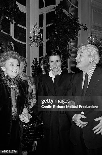 Actors Edwige Feuillere, Fanny Ardant, and Jean Marais attend an event in Paris where Feuillere was decorated with the Legion d'Honneur medal. Edwige...