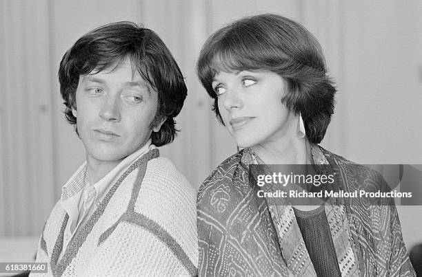 French actors Bernard Giraudeau and Anny Duperey looks at each other over their shoulders. Giraudeau and Duperey were in Cannes to attend the 34th...