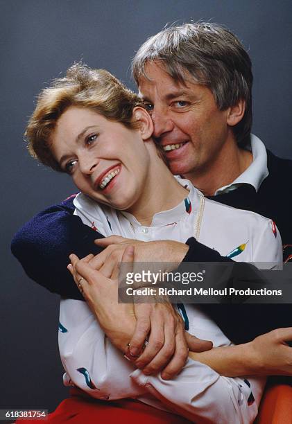 French actress Sylvia Kristel, popular star of the Emmanuelle films, and movie director Just Jaeckin hugging. Jaeckin directed the 1981 French film...