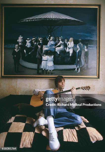 French Singer Pierre Bachelet Playing Acoustic Guitar