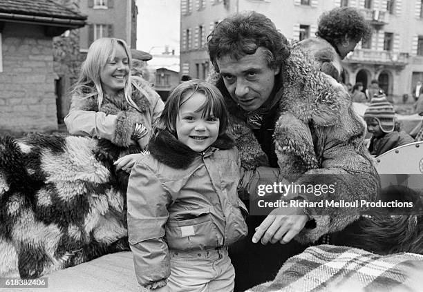 French singer Michel Sardou with his wife Babette and his sons Romain and Davy on winter holiday.