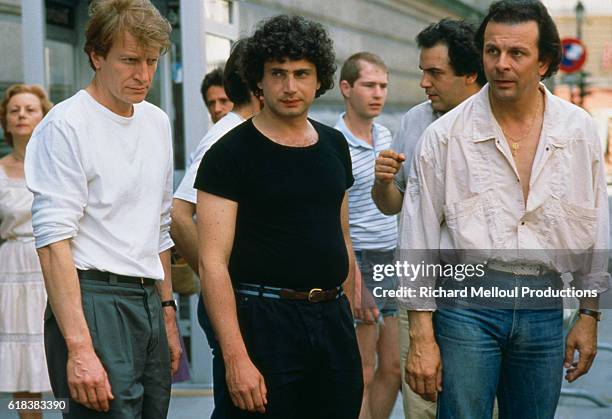 French actors Andre Dussollier, Michel Boujenah, and Roland Giraud star in the 1985 French film Trois Hommes et un Couffin by French director Coline...