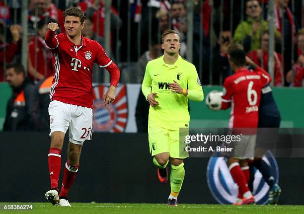 Thomas Mueller of FC Bayern Muenchen reacts after he fails to score his team's 3rd goal by penalty kick during the DFB Cup second round match between...