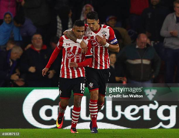 Sofiane Boufal of Southampton celebrates scoring his sides first goal with Jose Fonte of Southampton during the EFL Cup fourth round match between...
