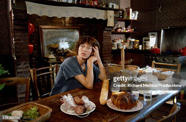 British singer and actress Jane Birkin in her kitchen.