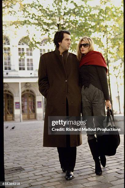 French philosopher Bernard-Henri Levy and French-American actress and singer Arielle Dombasle.