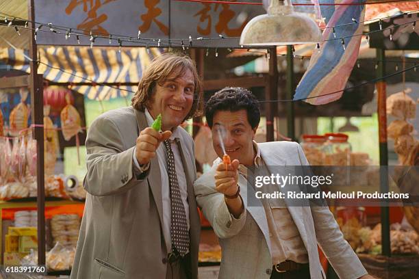 French actors Gerard Depardieu and Christian Clavier on the set of the film Les Anges Gardiens.