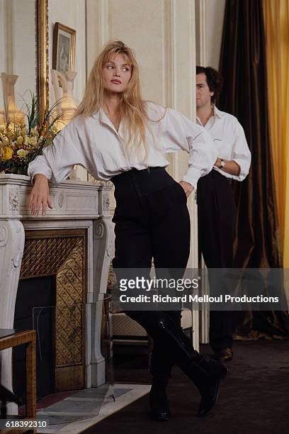 French philosopher Bernard-Henri Levy and French-American actress and singer Arielle Dombasle at home.