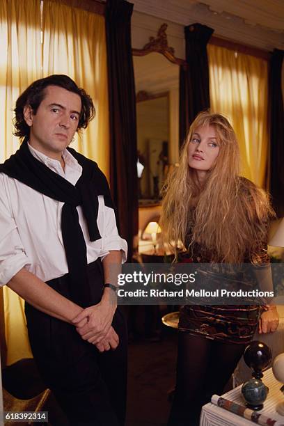 French philosopher Bernard-Henri Levy and French-American actress and singer Arielle Dombasle at home.