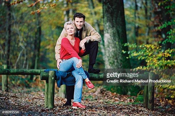 French television presenter Sophie Davant and sports presenter husband Pierre Sled enjoy some spare time in the forests around Normandy.