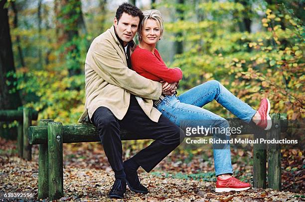 French television presenter Sophie Davant and sports presenter husband Pierre Sled enjoy some spare time in the forests around Normandy.