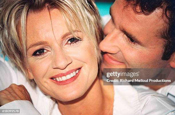 French television presenter Sophie Davant and sports presenter husband Pierre Sled enjoy some spare time in their Normandy home.