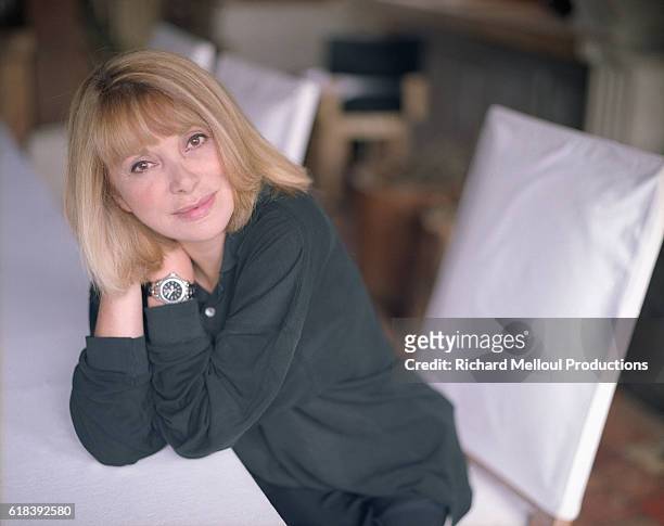 French actress Mireille Darc at home.