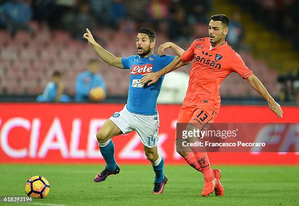 Napolis player Dries Mertens vies with Empoli FC player Frederic Veseli during the Serie A match between SSC Napoli and Empoli FC at Stadio San Paolo...