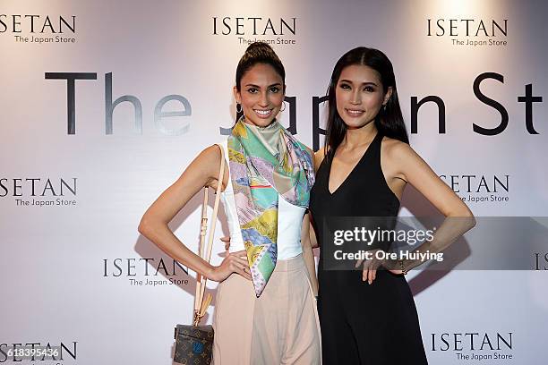 Deborah Henry, Miss Malaysia Universe, and Amber Chia, model attends the ISETAN The Japan Store KUALA LUMPUR opening reception party on October 26,...