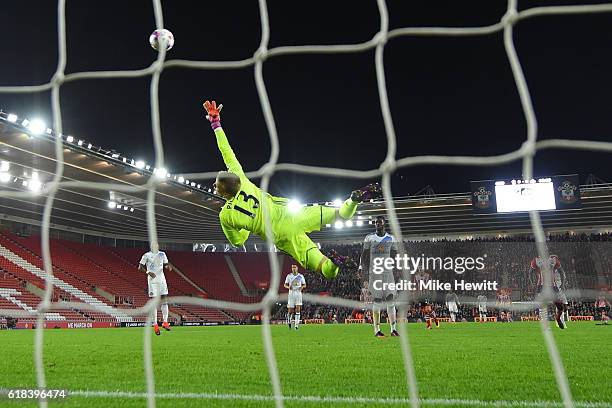 Jordan Pickford of Sunderland attempts to save Sofiane Boufal of Southampton goal but fails during the EFL Cup fourth round match between Southampton...