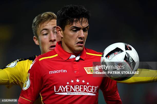 Dortmund's defender Felix Passlack and Berlin´s Eroll Zejnullahu vie for the ball during the German Cup DFB Pokal second round football match BVB...