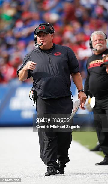 Head Coach Chip Kelly of the San Francisco 49ers stands on the sideline during the game against the Buffalo Bills at New Era Field on October 16,...