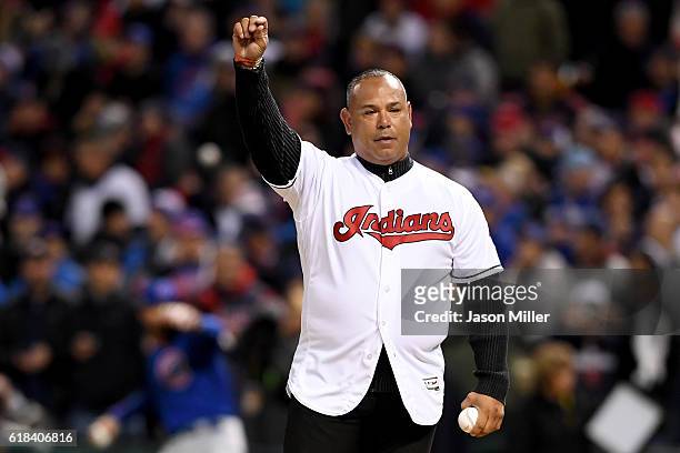 Former Cleveland Indians player Carlos Baerga gestures prior to throwing out the ceremonial first pitch before Game Two of the 2016 World Series...