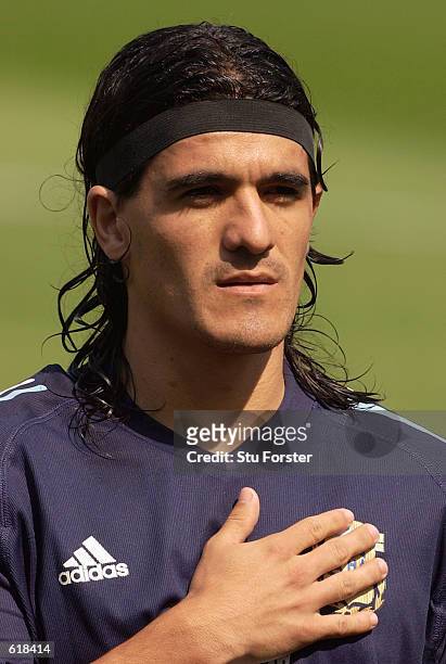 Ariel Ortega of Argentina lines up during the national anthems before the Group F match against Nigeria of the World Cup Group Stage played at the...